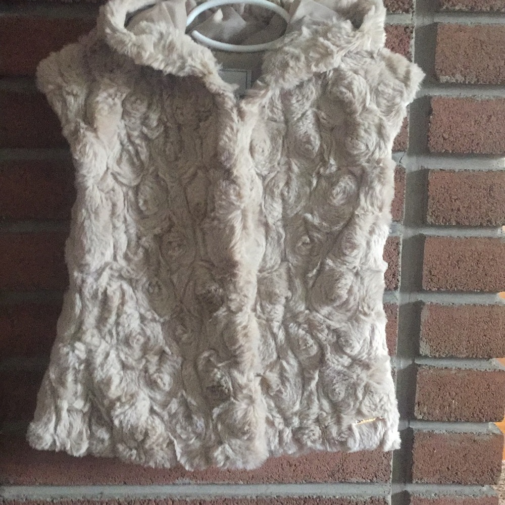 Faux fur hooded vest.